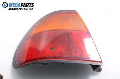 Tail light for Mazda 323 (BA) 1.5 16V, 88 hp, sedan, 1996, position: left